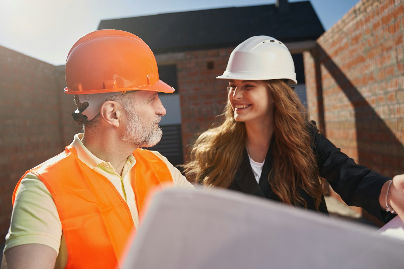 Team work and collaboration of architects at the building site