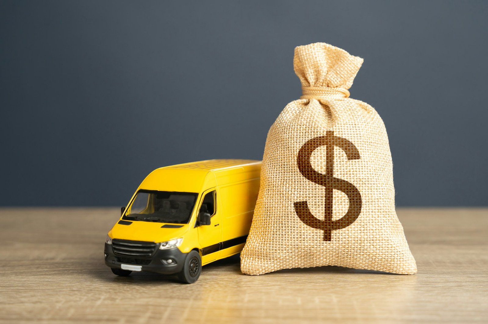 Delivery van and dollar money bag. Supply chain resilience.